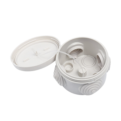 Caja Derivación-Conexión de Plástico Circular con 4 Glándulas de Goma (70 diámetro X 48 alto mm). Para Instalaciones Comerciales, Residenciales e Industriales. Cerrado a Presión.